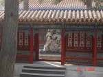 One of the entraces to the court-yard with the stone monument in the middle.