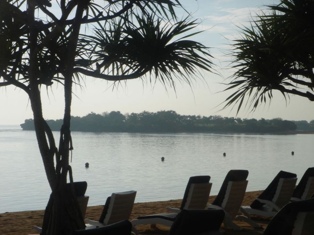 Looking across the bay from the beach towards the evening