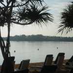 Looking across the bay from the beach towards the evening