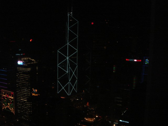 Wider shot of the Bank of China Tower and the surrounding buildings.