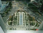 The view of the ground level of the other side of the skybridge