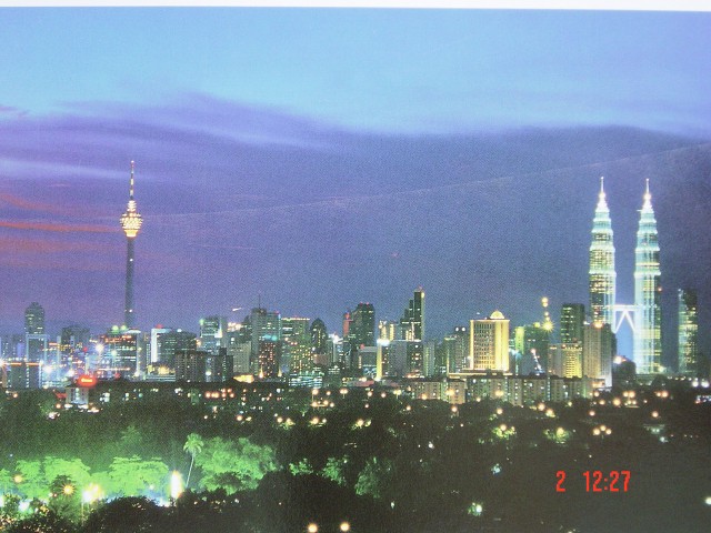 Night view of the skyline and the Petronas Twin Towers and the KL Tower