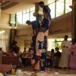 Forming a new human pyramid!