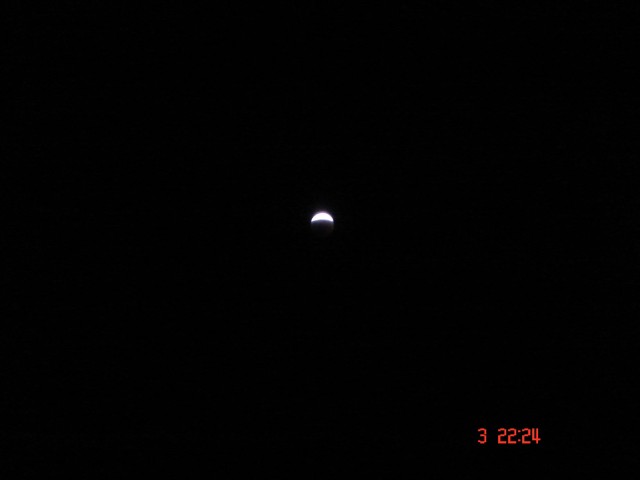 Every minute, more of the shadow is cast over the Moon's surface.