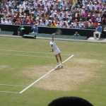 Still-frame of a Henin-Hardenne serve