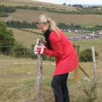 Wendy working away at one of those darn posts...they were dug well into the ground :(