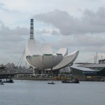 The Art Science Museum with the Singapore Flyer in the backdrop - navy boats at the forefront.