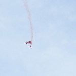 The parachutists fly in...