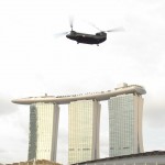 Chinook flying in front of the Sands