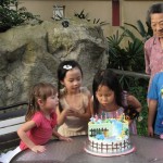 Helping to blow out the candles!