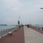 Looking out along the pier across the water