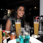 Neha admiring her drinks selection