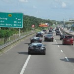 The fast cars skirt around the traffic :)